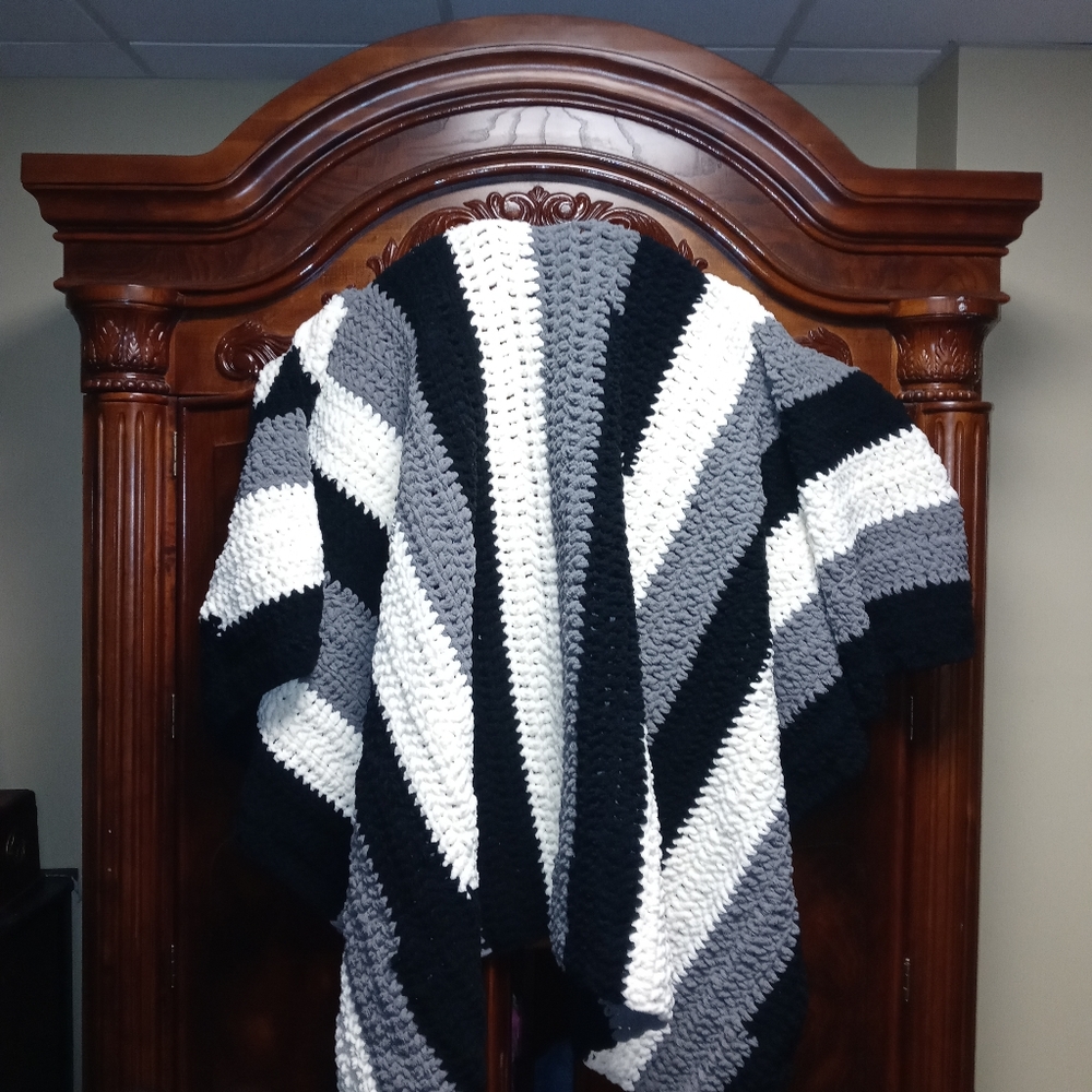 Hand crocheted super soft blanket.